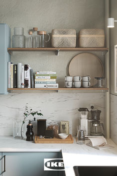 the shelves in this kitchen are filled with coffee and tea pots, books, and other items