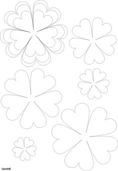 four leaf clovers cut out from paper