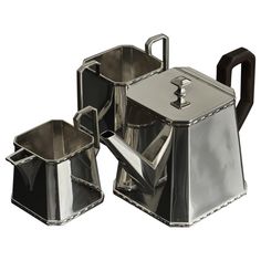 three pieces of stainless steel tea set with black handles and square cups on each side