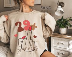 "I Am 29+ Middle Finger Sweatshirt, Personalized 30th Birthday Sweater, Custom 1994 Birthday Party Shirt, Funny I Am 29 Plus Tshirt, 30 Bday HOW TO ORDER ➀ Select color ➁ Select the size (Please check size chart) ✦ True to size. Size up 1-2 sizes for an oversized look. ➂ Add to cart ✦ (Optional) \"Add message to Seller\" on the checkout page. GARMENT FEATURES ✦ Crew neckline ✦ Direct to garment printing - no vinyl, decal, or iron-on technique ✦ Our designs are printed on the garment to last a lo 1994 Birthday, 1984 Birthday, Birthday Sweater, 30th Bday, Birthday Party Shirt, Funny Me, 30th Birthday, Party Shirts, 40th Birthday