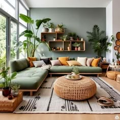 a living room filled with lots of furniture and plants