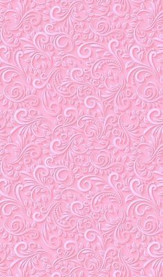 a pink background with swirls on it