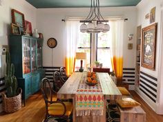 the dining room table is made from wood planks