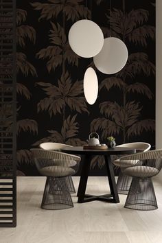 an elegant dining room with black and white wallpaper, modern chairs and table in the center