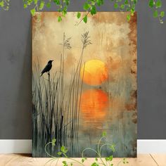 a painting with a bird sitting on top of it in front of the sun and water