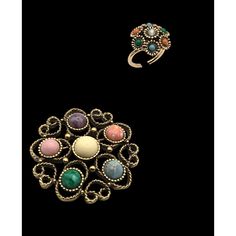 This vintage Sarah Coventry brooch and ring set embodies retro fashion elegance. The multicolored stones set in a gold-tone finish accentuate its timeless appeal. Ideal for those who appreciate vintage accessories, this set adds charm and sophistication to any ensemble, making it a valuable addition to any collector's jewelry box. * Brooch and ring set   * Multicolored stones   * Gold tone finish   * Adjustable ring   * Retro design   * Sarah Coventry brand   * Costume jewelry style Brooch diameter = 2 inches Beautiful Vintage Sarah Coventry Brooch and Ring Combo Set Measurement:  Brooch: 2 " Ring: Size 6 Adjustable Great Holiday Look ! Estate Fresh as shown. Retro Costume, Sarah Coventry, Stone Gold, Vintage Accessories, Stone Settings, Retro Design, Adjustable Rings, Metal Jewelry, Costume Jewelry