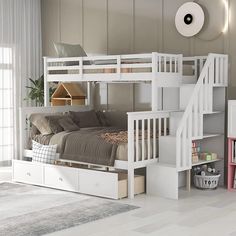 a white bunk bed with drawers underneath it