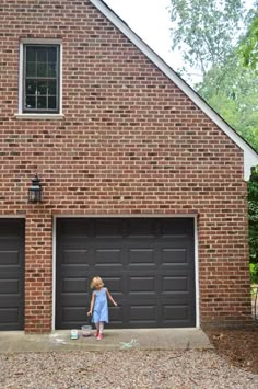 Young House Love | Painting Our Garage Doors A Richer, Deeper Color Rendered Brick, Brown Garage Door, Garage Door Trim, Red Brick House Exterior, Garage Door Colors, Red Brick Exteriors, Garage Door Paint, Brick House Exterior, Garage Door Styles