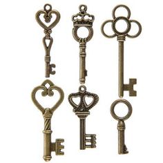 six antique keys with hearts and keyholes on each one, all in different styles