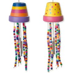 two colorful lamps with beads hanging from them