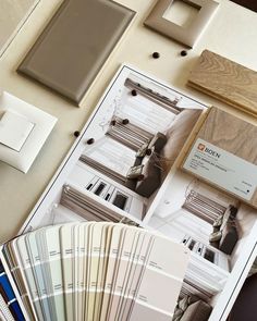 an assortment of interior paint samples on a table with the same color swatches and colors