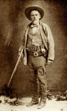 TEXAS JOHN SLAUGHTER — How fitting that the 1887 Winchester pump shotgun was created the same year that Texas John Slaughter became Cochise County sheriff. He handsomely wields that scattergun in this photograph, while he also packs his pearl-handled Colt Peacemaker. His Arizona peers called him Texas John because of his years working as a Texas Ranger.In 1886, he was elected sheriff of Cochise County, Arizona, five years after the Gunfight at the O.K. Corral. Western Photos, Western Stuff, Real Cowboys