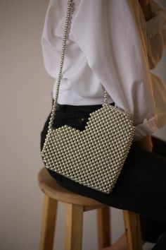 "Pearl beaded heart bag. White bag on a strap. Personalized strap lengtg. If you are looking for a gift for Valentine's Day or for your partner birthday- a handbag \"heart\" is a great idea. Material: white acrylic pearl beads 8mm. PROCESSING TIME 2-3 days🔥 SIZE: *Height: 21cm *Width: 22cm Bonus: free surprise for all orders. In addition to the gift, a hand-signed postcard with a message from the purse is attached to the order. If this is a present, be sure to write me the name of the recipient✒ More pearl bags💥 https://www.etsy.com/shop/VitakaJewelry?ref=seller-platform-mcnav&section_id=29560344 !!Please be aware that some countries impose customs fees and taxes for packages that enter your country.  These fees are kept by your government and outside of your purchase with me. *If you ar Pearl Bags, Beaded Heart, Pearl Bag, Bag Silver, Beaded Bag, Heart Bag, Handmade Bag, Birthday Gift For Her, Personalized Birthday Gifts