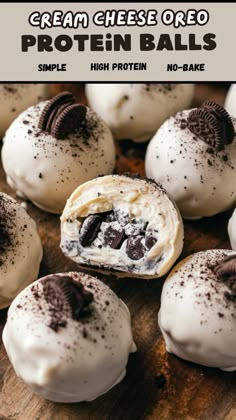 cream cheese oreo protein balls with chocolate chips on top and white frosting in the middle