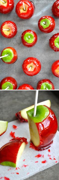 an apple being dipped with red and green apples