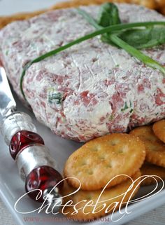 a plate with cheese and crackers on it