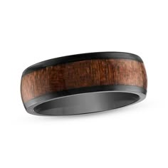 a wedding band that is made from wood and black ceramic