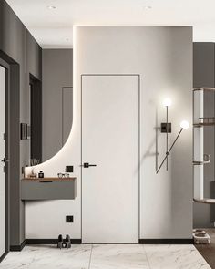 a modern bathroom with marble flooring and white walls, along with an open door