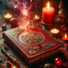 a red book surrounded by candles and other items on a table with stars in the background