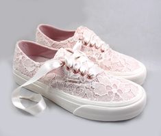 "Blush Vans with Ivory Lace - Bridal Vans --Lace Vans -- Wedding Tennis shoes - Wedding Vans Limited Edition. I only have a few sizes in this color combination. For the girl who wears her Vans to every occasion.... why shouldn't you wear them to your wedding? Skip down the aisle in comfort in these beautiful ivory lace Vans! Pictured with the Authentic SF Vans style in Blush with ivory sequin lace and ivory ribbon shoelaces. Alternate ribbon shoelace colors are available upon request. Available Vans Wedding Shoes The Bride Elegant, Vans Wedding Shoes The Bride Comfortable, Lace-up Wedding Shoes With Laces, Lace-up Wedding Shoes For Ceremony, Lace-up Wedding Shoes With White Laces, White Vans Wedding Shoes, Cream Wedding Shoes With Laces And Round Toe, Wedding Vans Shoes, Decorated Sneakers