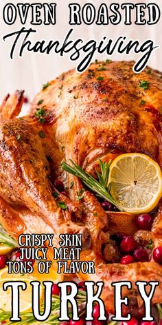 a turkey on a platter with cranberries and lemons