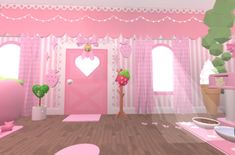 a room with pink walls and decorations on the floor, in front of two large windows