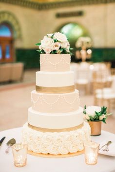 a wedding cake sitting on top of a table