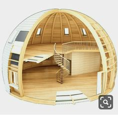 the inside of a round wooden structure with stairs