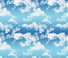 the sky is filled with white clouds and blue skies are in the background, as well as some type of letters