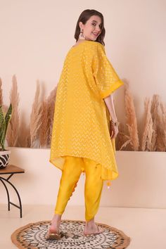 Yellow kimono style kurta with gota, thread, shell tassel embroidery in wave pattern. Paired with slip and scallop dhoti pant. - Aza Fashions Cutdana Palazzo Set For Puja And Navratri, Eid Dabka Palazzo Set With Tunic, Anarkali Chikankari Embroidery Tunic Set, Anarkali Tunic Sets With Chikankari Embroidery, Navratri Cotton Silk Sets With Dupatta, Eid Chikankari Embroidery Tunic Set, Eid Dabka Tunic Kurta, Eid Chikankari Embroidered Tunic Set, Eid Dabka Kurta Tunic