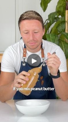 a man pouring peanut butter into a white bowl on top of a table with the words if you mix peanut butter