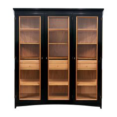 a black and wood bookcase with glass doors