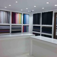 a store with lots of different colored fabrics