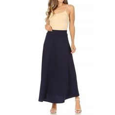 Product Description: Solid Color: This skirt comes in a single, solid color, which gives it a classic and versatile appearance. Common colors include black, navy, gray, or other neutral tones. High Waist: The high-waisted design means that the skirt's waistline sits above the natural waist. This style accentuates the waist and provides a flattering fit. It can also help create an elongated and elegant silhouette. Flare A-line: The skirt is cut in an A-line shape, which means it is fitted at the Moa Collection, Skirt With Elastic Waistband, Long Maxi Skirts, High Waisted Flares, Navy Gray, Leather Mini Skirts, Feminine Look, Neutral Tones, Women's Casual