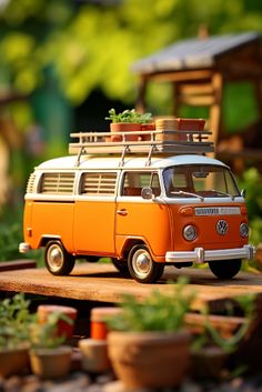 an orange and white van with plants on top