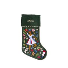 a green christmas stocking with an image of a woman dancing on the dancefloss