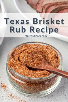 texas brisket rub recipe in a glass jar with a wooden spoon next to it