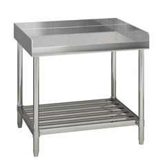 a stainless steel sink with shelf on the side