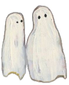 two white ghost figurines sitting next to each other