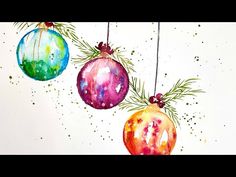 watercolor christmas ornaments hanging on a string with pine needles and red, green, blue and yellow baubles