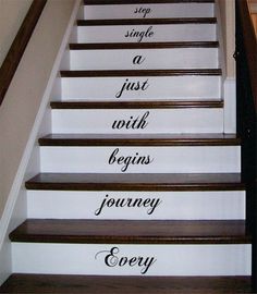 the stairs are painted with words on them