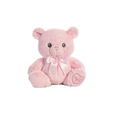 a pink teddy bear with a bow on it's head sitting against a white background