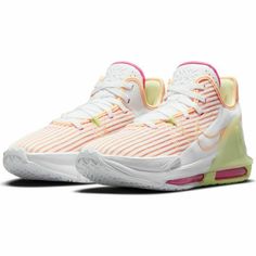 the nike air zoom basketball shoe in white and pink