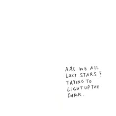 a white wall with writing on it that says are we all lost stars trying to light up the dark