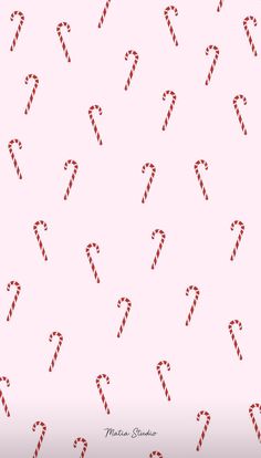 a candy cane pattern on a pink background