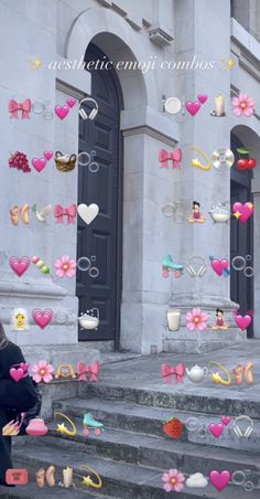 a woman standing in front of a building with lots of heart shaped objects on the steps