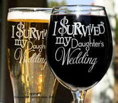 two wine glasses sitting next to each other on top of a tabletop with the words i survived my daughter's wedding written on them