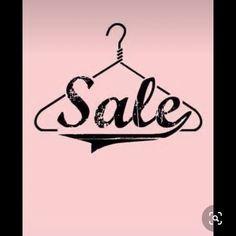 the word sale is hanging on a hanger