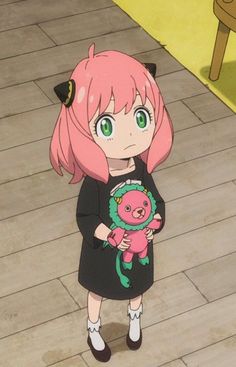 a girl with pink hair and green eyes holding a teddy bear in front of her