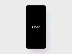 a black phone with the word uber on it's back and white background